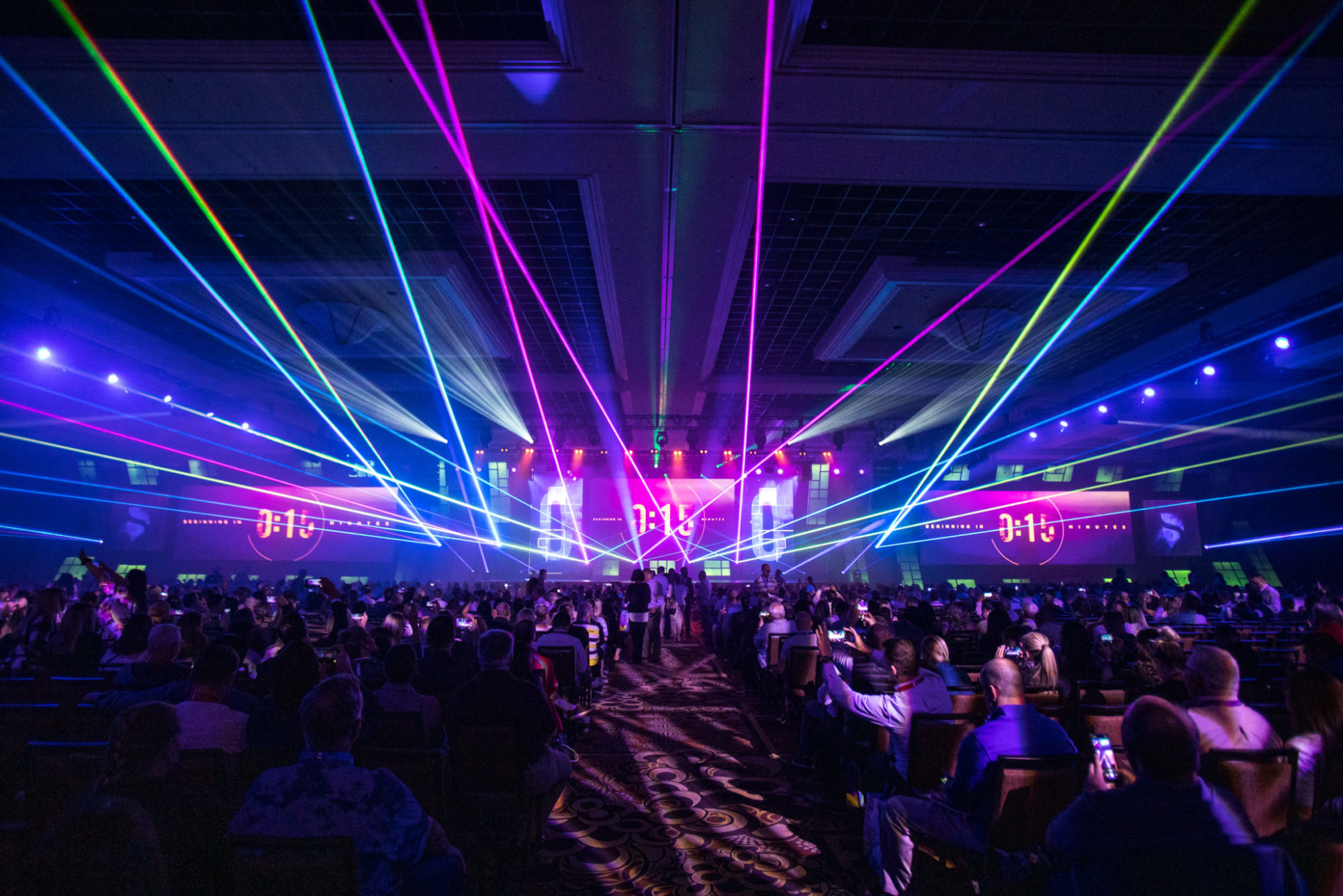Immersive laser show filling a large arena