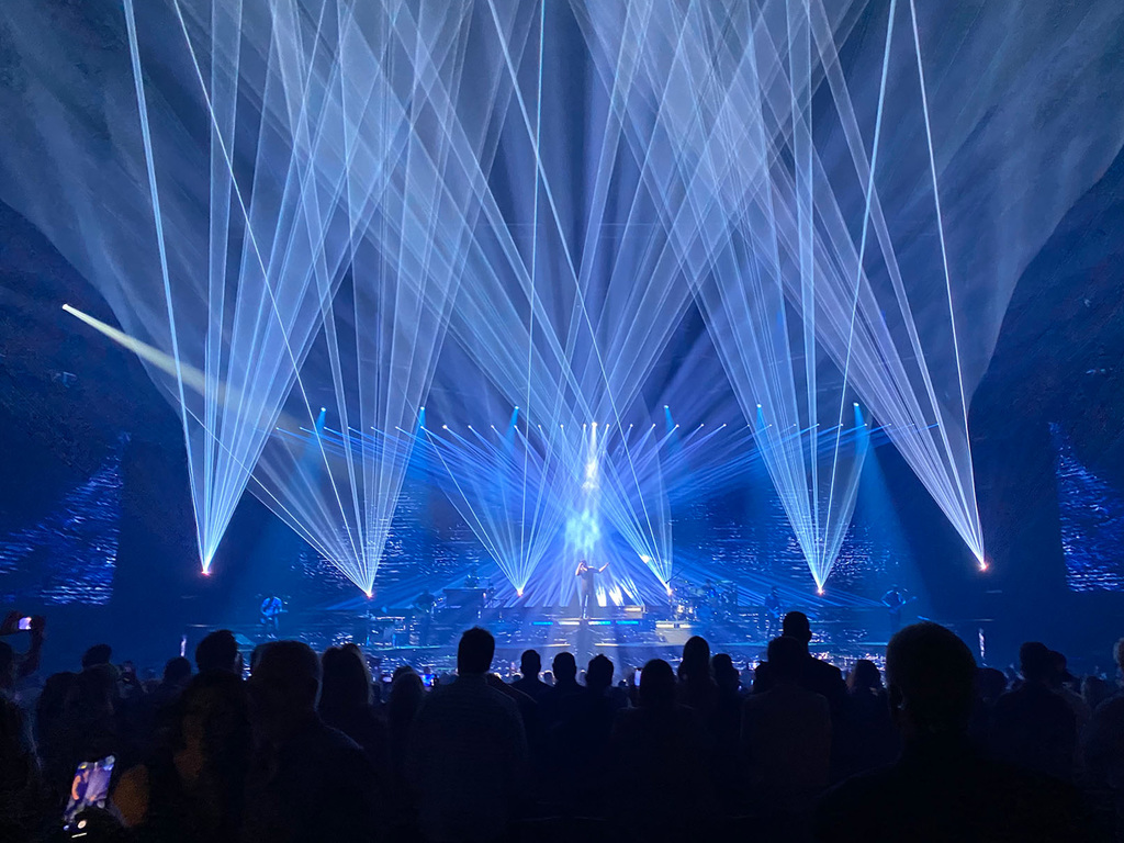 Las Vegas concert production with synchronized blue laser beams